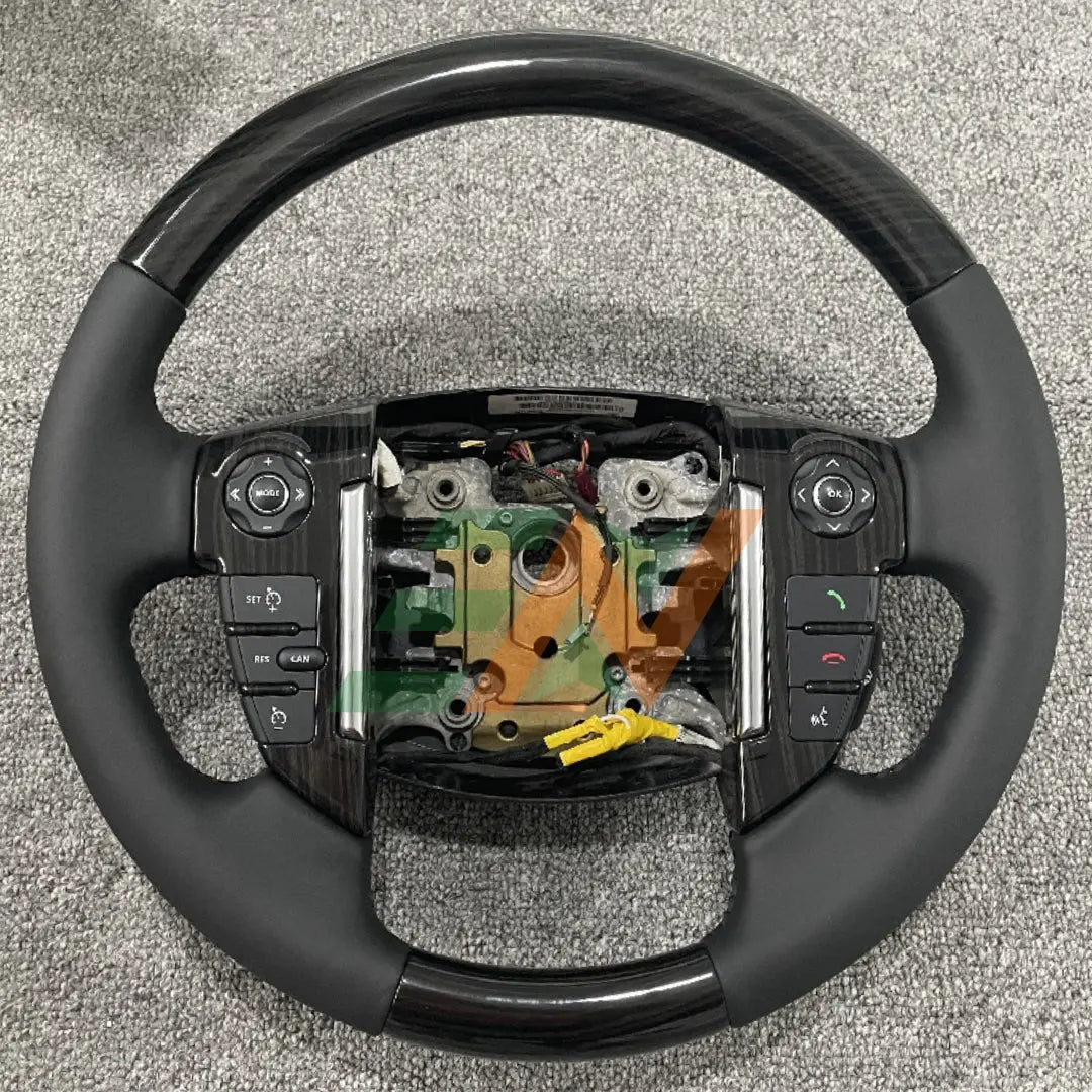Volante de cuero perforado negro piano para Range Rover Sport y Discovery 3